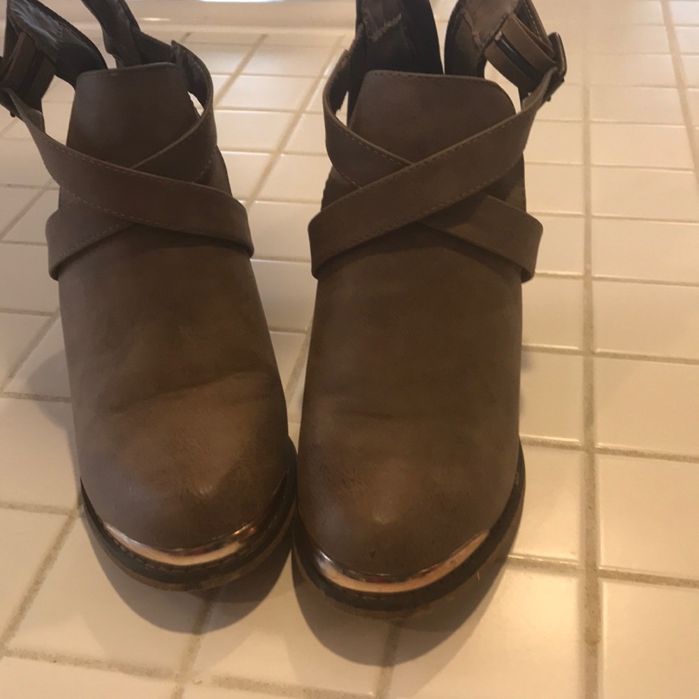 Booties, brass hardware buckle and on toes